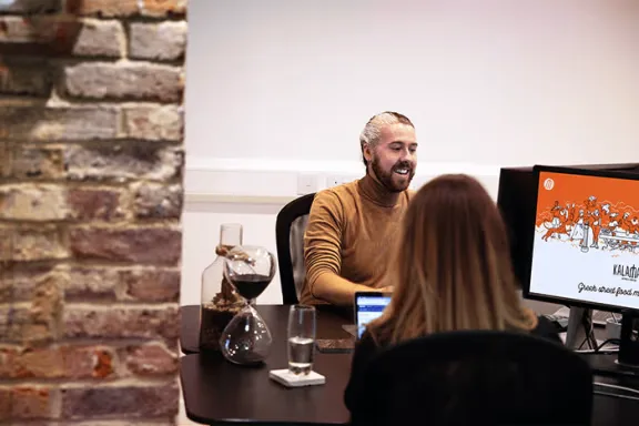 web agency London desk talking